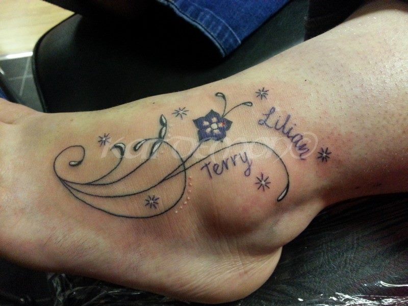 girly flower name tattoo